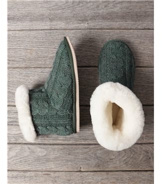 Bottes en peau de mouton avec câble en laine