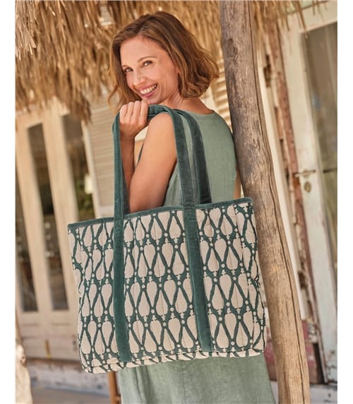 Gemusterte Henkeltasche