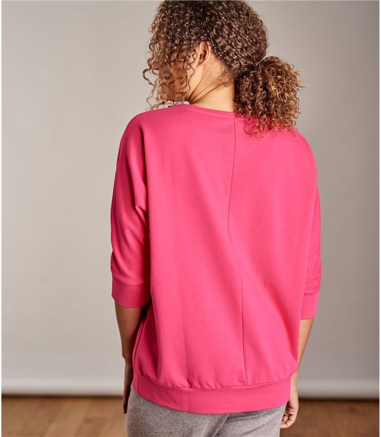 fuchsia pink sweatshirt