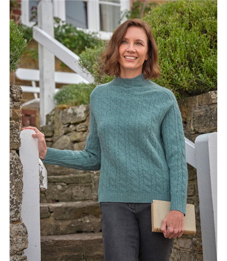 Pull à col roulé et torsades