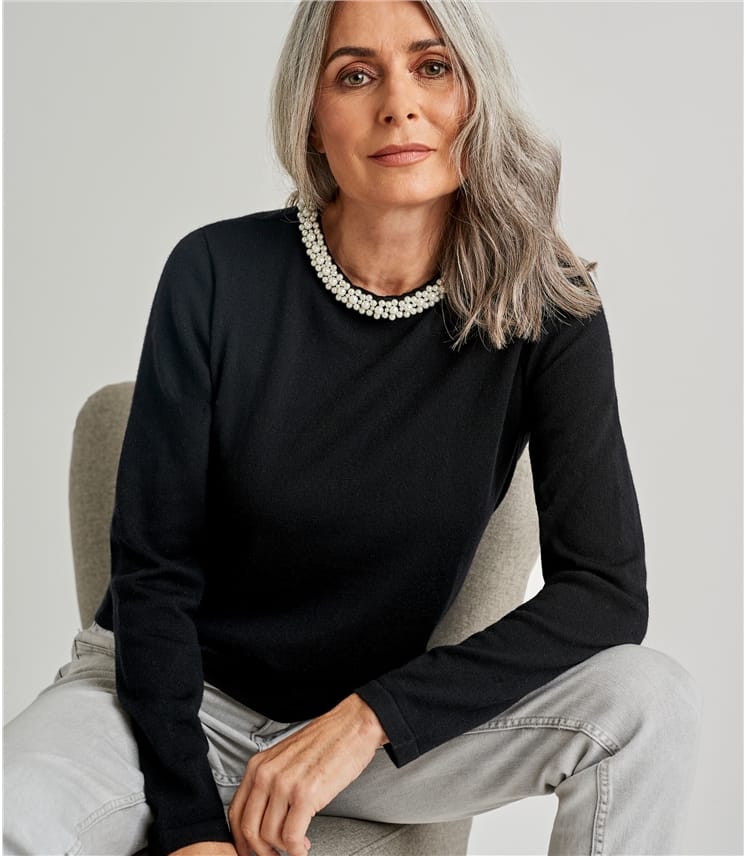 pearl covered sweater