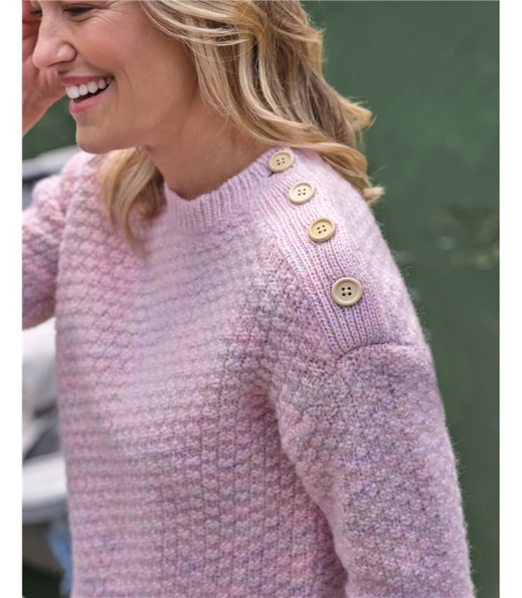 Pull torsadé texturé